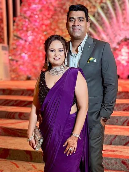 A lovely couple photo where the client's neat braid adds to her graceful and elegant appearance.