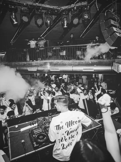 Welcome to the Craftyverse. This black and white shot captures the raw power of a night at FLO, with CO2 cannons firing and the crowd lost in the music.