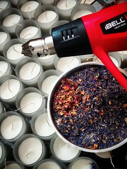 There's a science to the art of candle making. Using my heat gun to get that perfect smooth top is a crucial step. It's these little details that make a handmade product special.