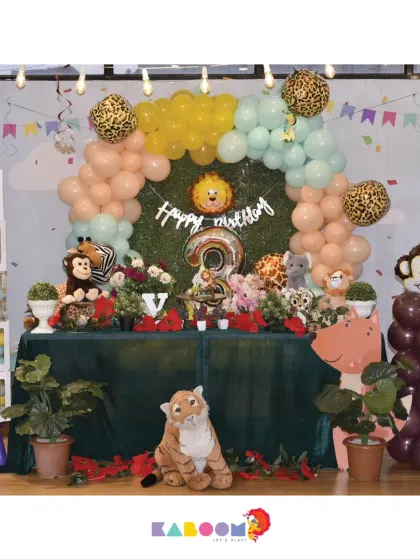 A wild jungle adventure awaits! This safari-themed party features plush animals, lush greenery, and leopard-print balloons for a fun and adventurous vibe.