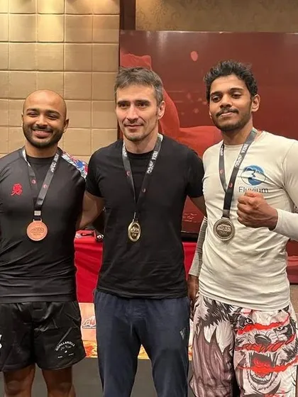 A duplicate of image 115, with friends and coaches at ADCC.