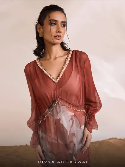 A portrait in the Aurelia Kaftan Set, where jeweled highlights illuminate its breezy contours.