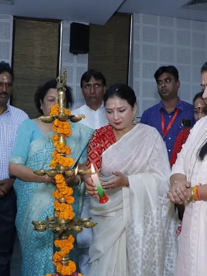 Guru Maa Smt. Ruby Mishra at the lamp lighting ceremony of the 'Mahila Unnati Samman' event.