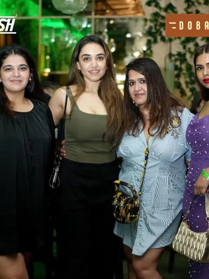 A group of ladies looking glamorous and ready to dance the night away.