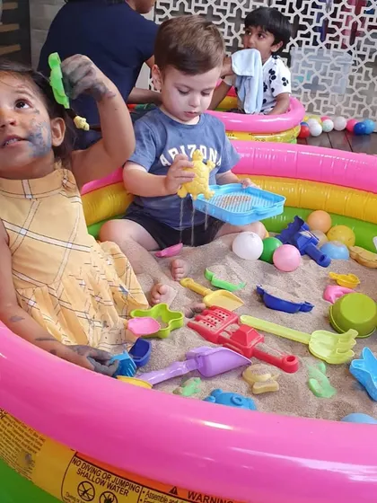 Our indoor sandpit is always a huge hit! It's a fantastic sensory activity where toddlers can dig, pour, and build, developing fine motor skills while having a blast.