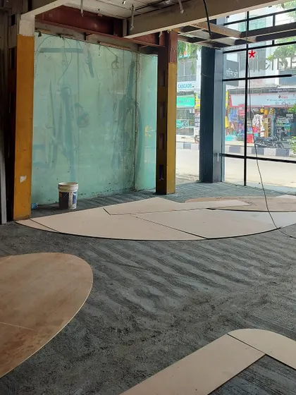The execution of our custom flooring design required precision. We created full-scale plywood stencils on-site to test the accuracy of our CAD drawings before the tiles were cut and laid with brass inlays, ensuring a flawless finish.