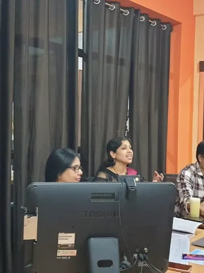 Our gurus engaged in discussion during an online examination, ensuring every student is assessed fairly.