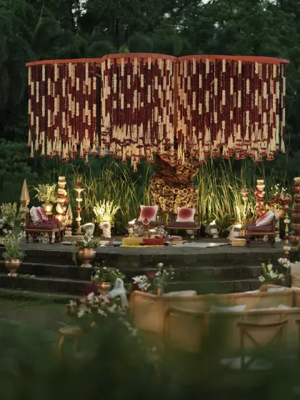 A view of the entire Banaras Ghat mandap from the guest seating area, highlighting its impressive structure and the detailed decor that extends to every corner of the venue.