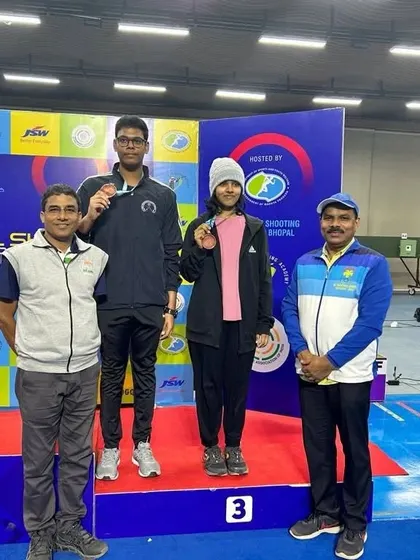 Pranavi and her partner on the podium after winning the Bronze Medal in the 10m Air Pistol Junior Mixed Event at the 66th National Shooting Championship.