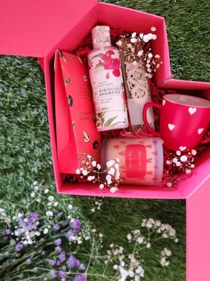 We have a secret. We absolutely love working with our associate Secret Hair Oil. This heart shaped box is filled with their products and other goodies, making it a perfect gift for any occasion.
