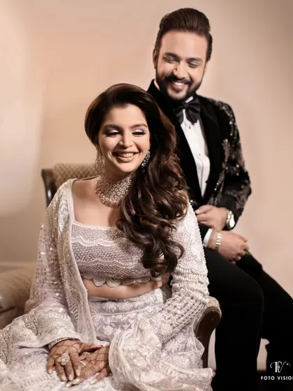 Arshi and Ashish share a laugh during their sangeet. The bride is radiant in her Manish Malhotra lehenga, a detail we make sure to highlight for our fashion conscious clients.