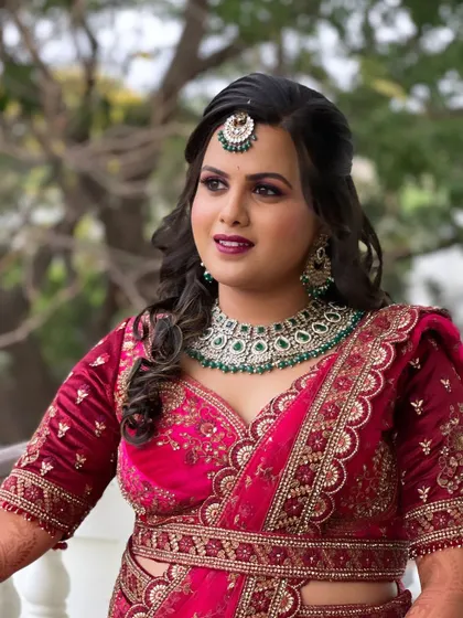 A three-quarter portrait of Supriya, showcasing her complete reception makeover.