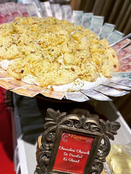 The spectacular Daulat Ki Chaat, presented with a flourish for a festive celebration. This traditional dessert is a testament to our commitment to authentic and memorable Indian sweets.