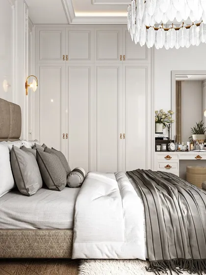 Another view of a luxurious neoclassical bedroom, highlighting the floor-to-ceiling wardrobes and integrated vanity table. The design maximizes storage while maintaining a clean and elegant aesthetic.