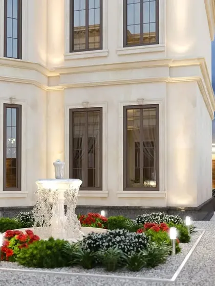 The landscaped garden with a central water fountain, designed to complement the bungalow's classic aesthetic.