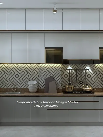 A kitchen with a grey and white color scheme and a geometric-patterned backsplash. The design is modern, clean, and highly functional.