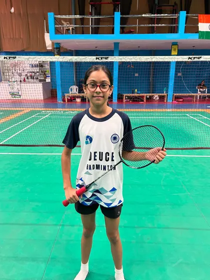 A member of our U11 girls' team, fully equipped and ready to compete.