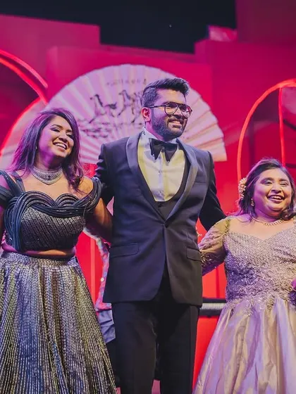 Happy Bhai Dooj! A candid moment of laughter and love between siblings on stage. We love creating these memories for families.