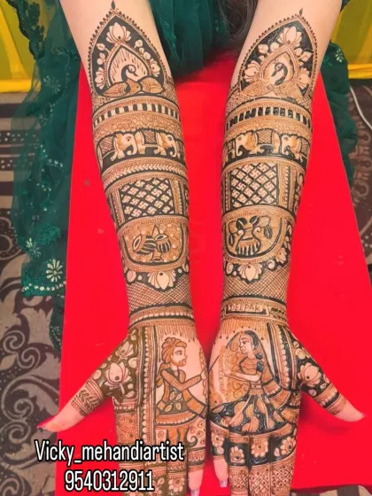 Capturing the moment of the Varmala ceremony in henna is one of my specialties. This full-coverage bridal design immortalizes that beautiful exchange, surrounded by elephants and traditional patterns, making your mehndi truly personal.