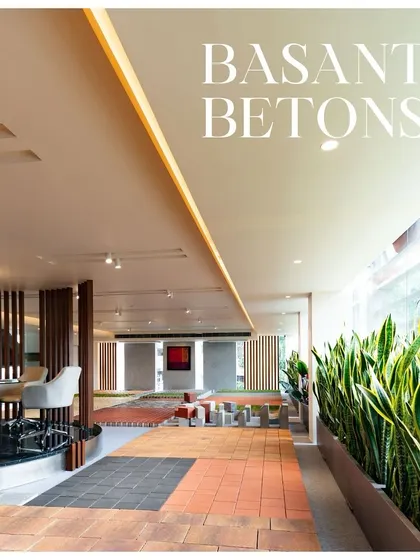 The Basant Betons showroom, featured in Architectural Digest. We designed this space as a green oasis on a busy commercial street, using the brand's own products to create a journey through landscaped courts and display areas.