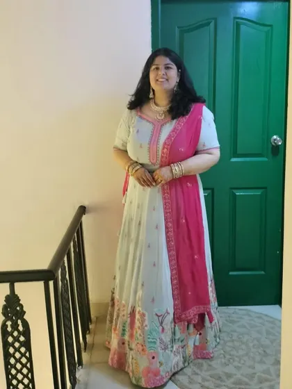 A closer look at the pastel blue lehenga with intricate floral embroidery. The combination of colors is so fresh and perfect for a daytime function.