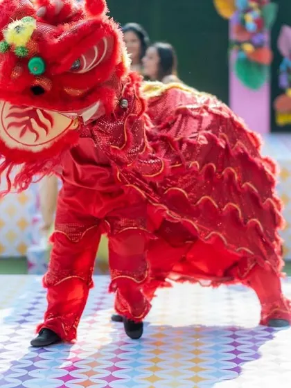 Unleashing the dragon of joy and culture. A traditional Chinese dragon dance was a unique and exciting entertainment choice for this multicultural carnival event.