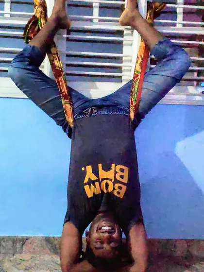 This is my happy place, hanging upside down. This supported Baddha Konasana in Sirsasana (Bound Angle Pose in Headstand) is deeply relaxing for the hips and lower back.