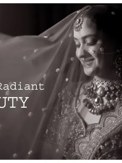 This black and white bridal portrait is all about radiance. The soft light on the bride's face and the delicate details of her veil create a dreamy and ethereal image that is truly timeless.