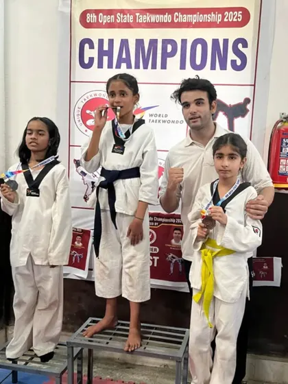 Our female warriors on the podium, showcasing their medals. I am incredibly proud of their performance.