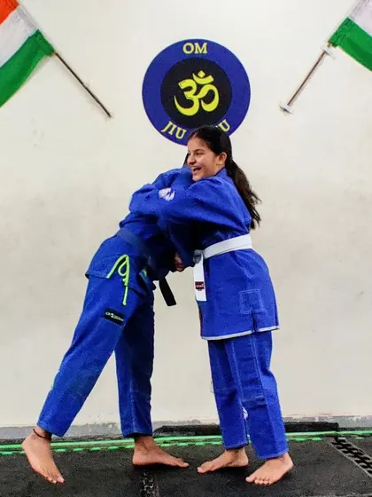 A hug of congratulations between training partners on promotion day. This shows the supportive and family-like atmosphere we cultivate at our academy.