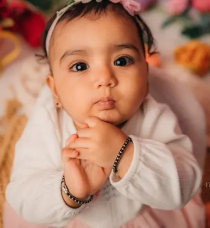 That innocent smile is everything. This little girl was a joy to photograph during her 8-month milestone session.