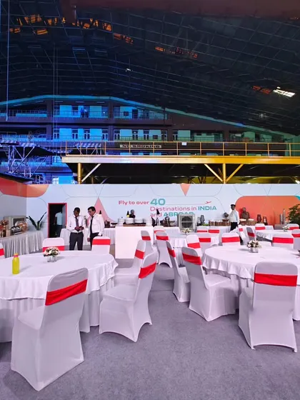 A view of our dining setup inside an Air India hangar for their "Gourmair" launch. We transformed this industrial space into an elegant event venue, proving we can create a premium experience anywhere.