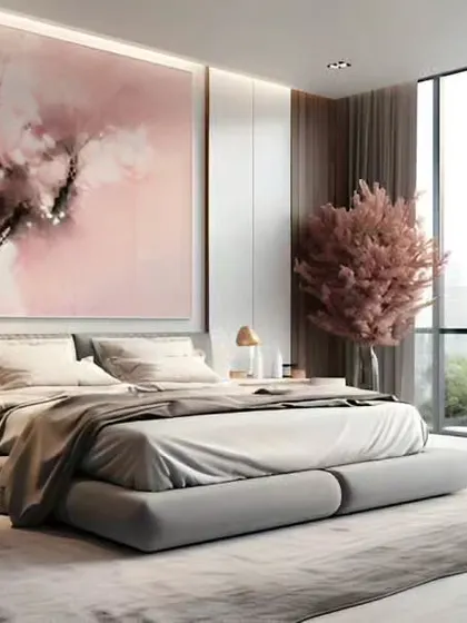Art can be the centerpiece of a room. In this modern bedroom, a large abstract painting in shades of pink sets a soft, romantic tone, complemented by a low-profile bed and large windows.