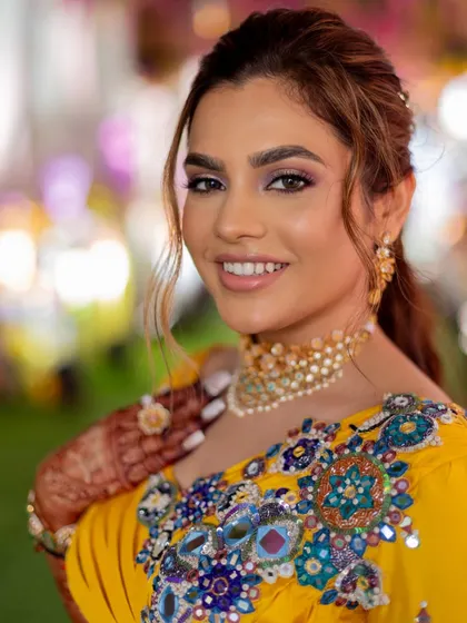 A beautiful, smiling portrait of the bride. You'll learn to create makeup that makes your clients feel confident and radiant.