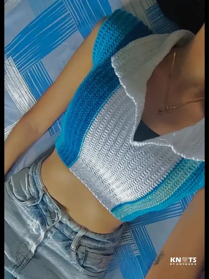 A close-up of the blue and white collared crop top. The ribbed texture and sharp collar make it look so put-together.