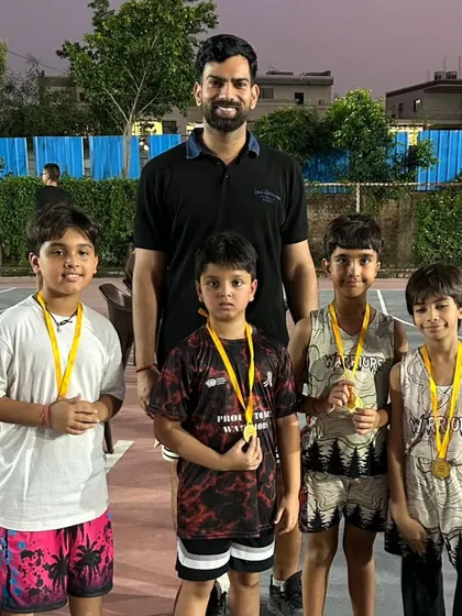 A group of our Under-10 champions posing with their medals after a hard-fought match.