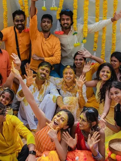 A fun group photo capturing the high energy of a rooftop Haldi ceremony. We make sure to get great shots of you with your friends and family.