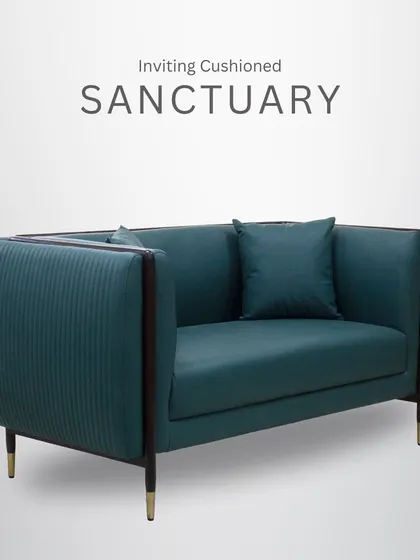 An inviting cushioned sanctuary, this loveseat features a deep teal upholstery with channel tufting and a sleek, dark wood frame. It's a perfect piece for a cozy and stylish space.