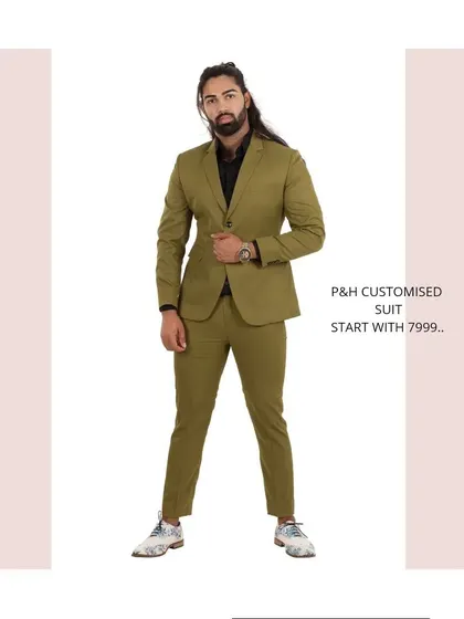 An olive green two-piece suit, offering a modern and stylish color choice for the fashion-conscious man.