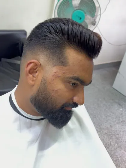 Another angle of the pompadour and skin fade.