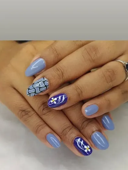 A lovely mix-and-match set in shades of blue, featuring floral art and a geometric pattern for a unique look.
