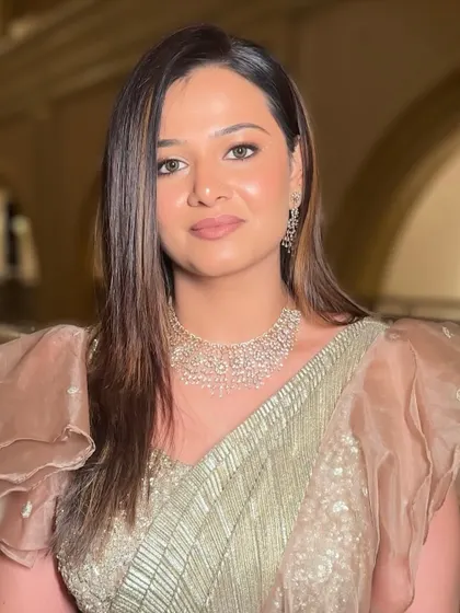 A close-up of the golden glam look. The dewy base and muted lips keep it classy and fresh, while the rhinestones add a playful twinkle.