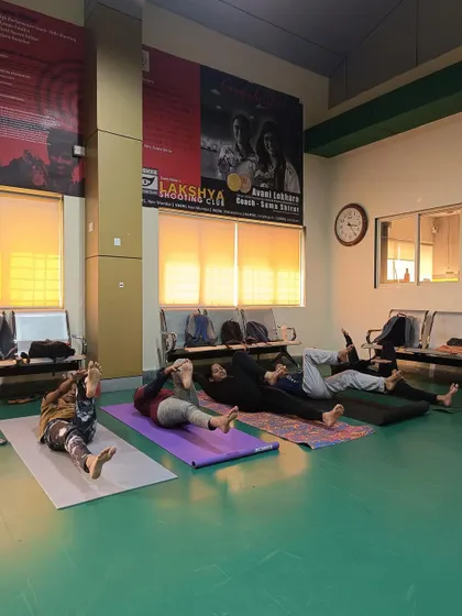Stretching and flexibility are key components of our yoga sessions, helping athletes improve their physical conditioning.