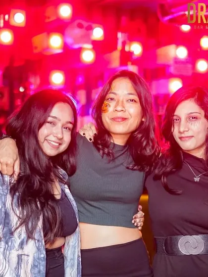 A group of friends enjoying the themed night at Drava.