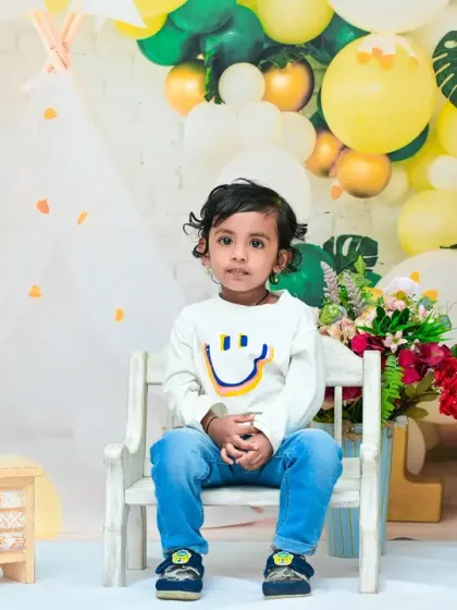 A thoughtful moment during a second birthday photoshoot. I capture a range of moods, not just the smiles, to provide a full picture of your toddler's personality.