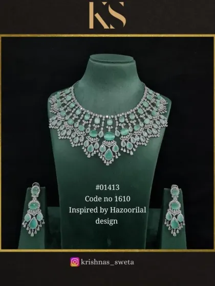This Hazoorilal-inspired set is also available in a delicate mint green, a fresh and modern option.