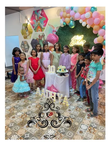 The birthday girl and her friends enjoying the tropical-themed party. My setups are designed to be the perfect backdrop for happy memories and group photos.