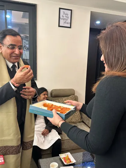 Sharing sweets after a successful meeting. It is the small moments of connection that make our demanding profession more rewarding.