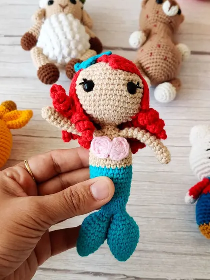 Another look at the beautiful crochet mermaid, showing the detail in her hair and tail.