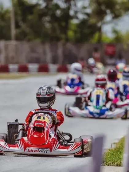 Abhay Racing leading a train of karts. Maintaining the lead under pressure is a skill we develop through rigorous on-track training and race simulation.